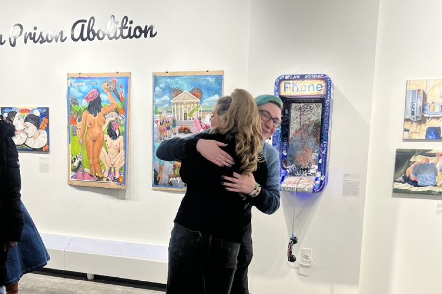 Artists hugging at Home Free in Akron.